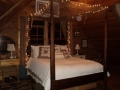 Master bed with lighted canopy